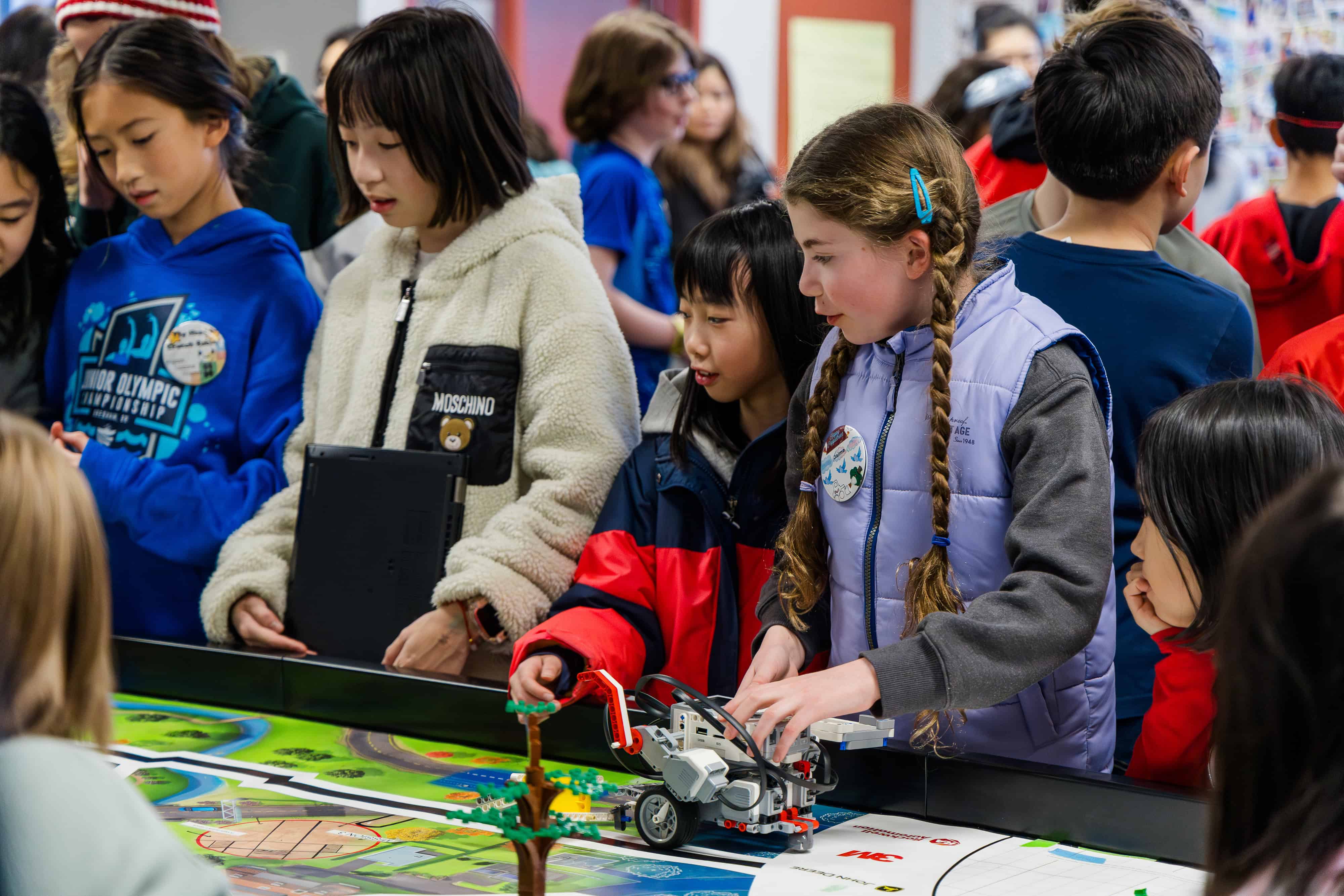 Students with finished robotics project