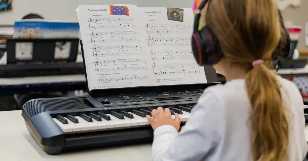 Student playing piano