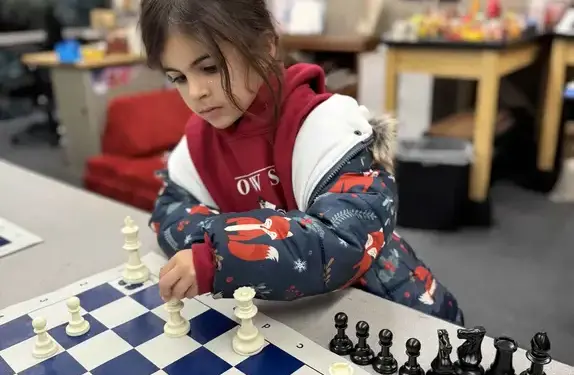 Student playing chess
