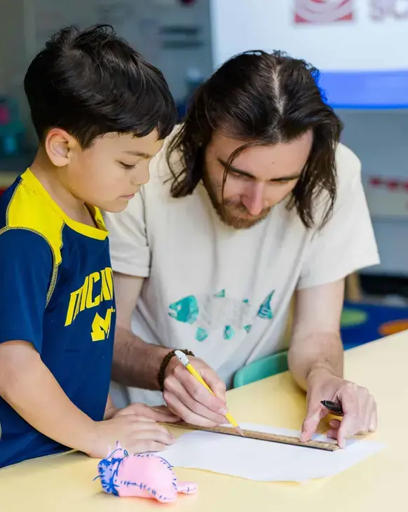 Teacher giving example to student