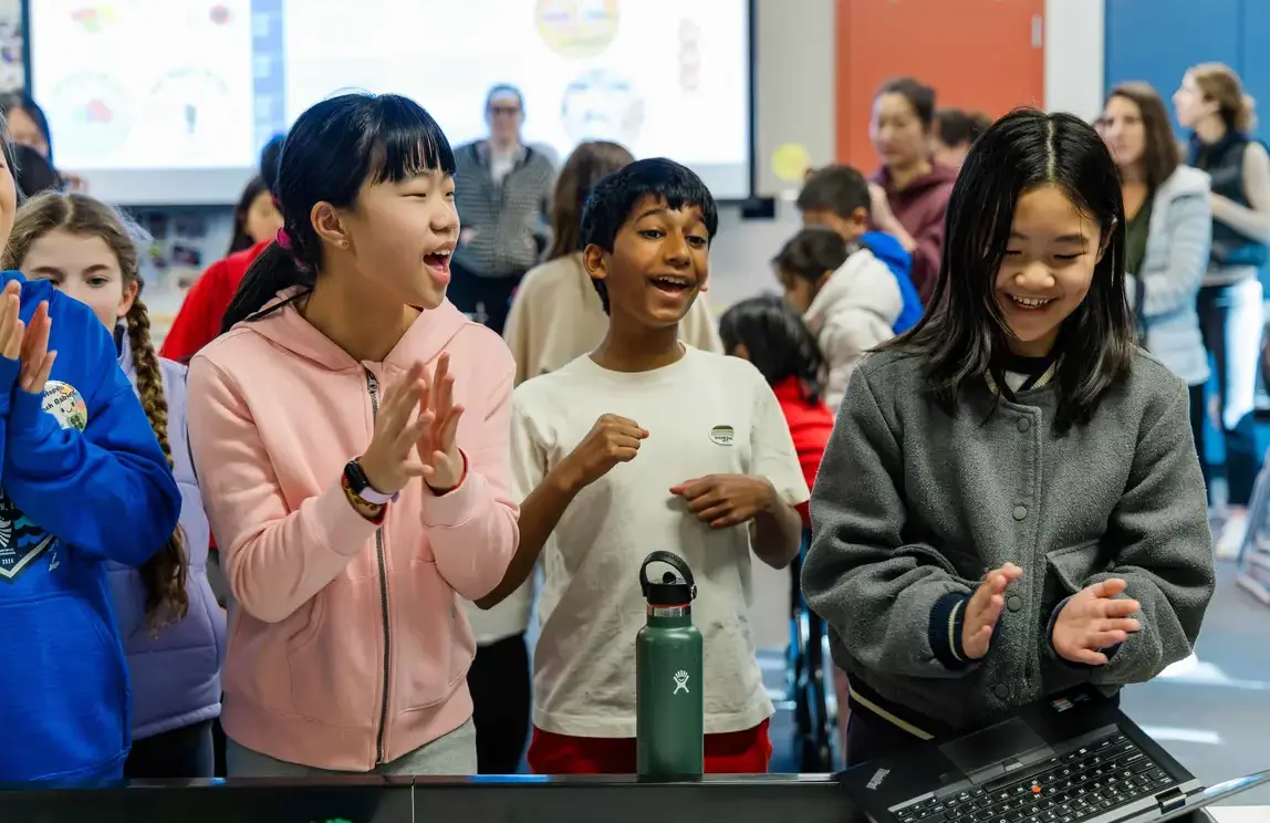 Students clapping hands