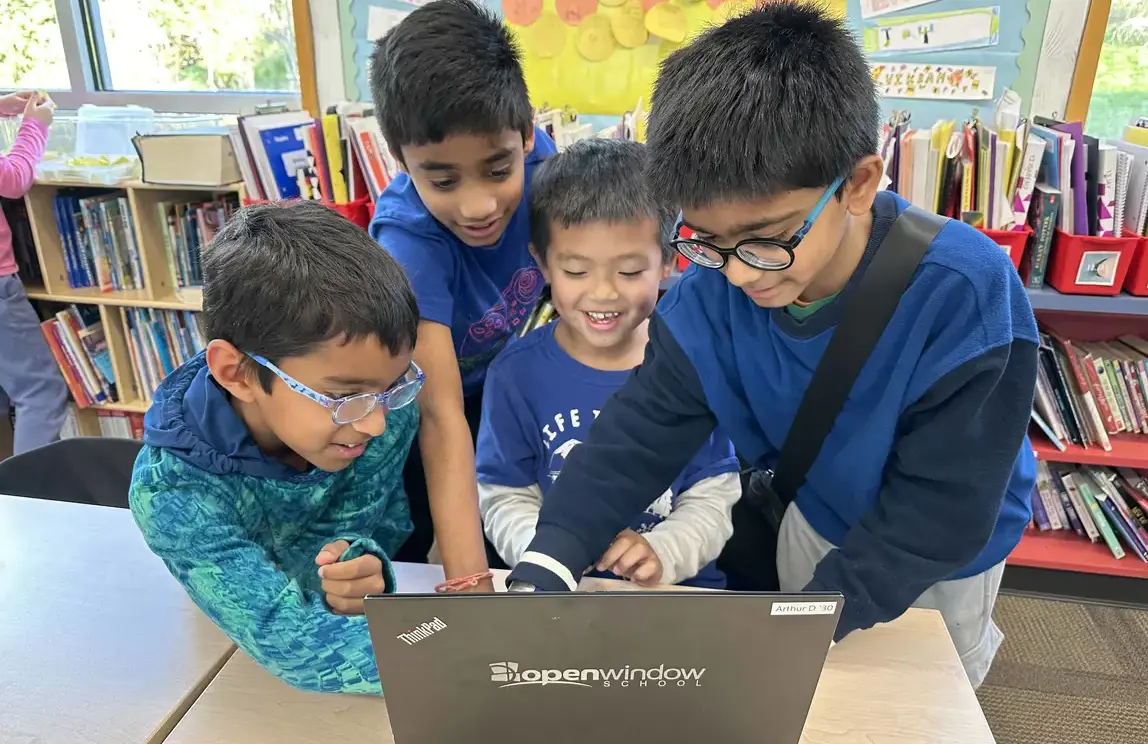 Students working on laptop