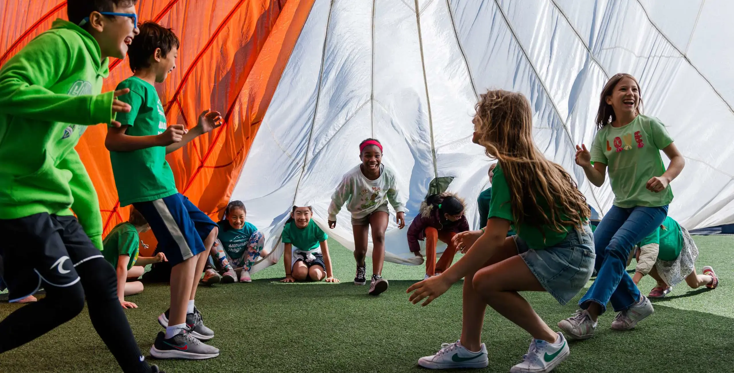 Students under parachute