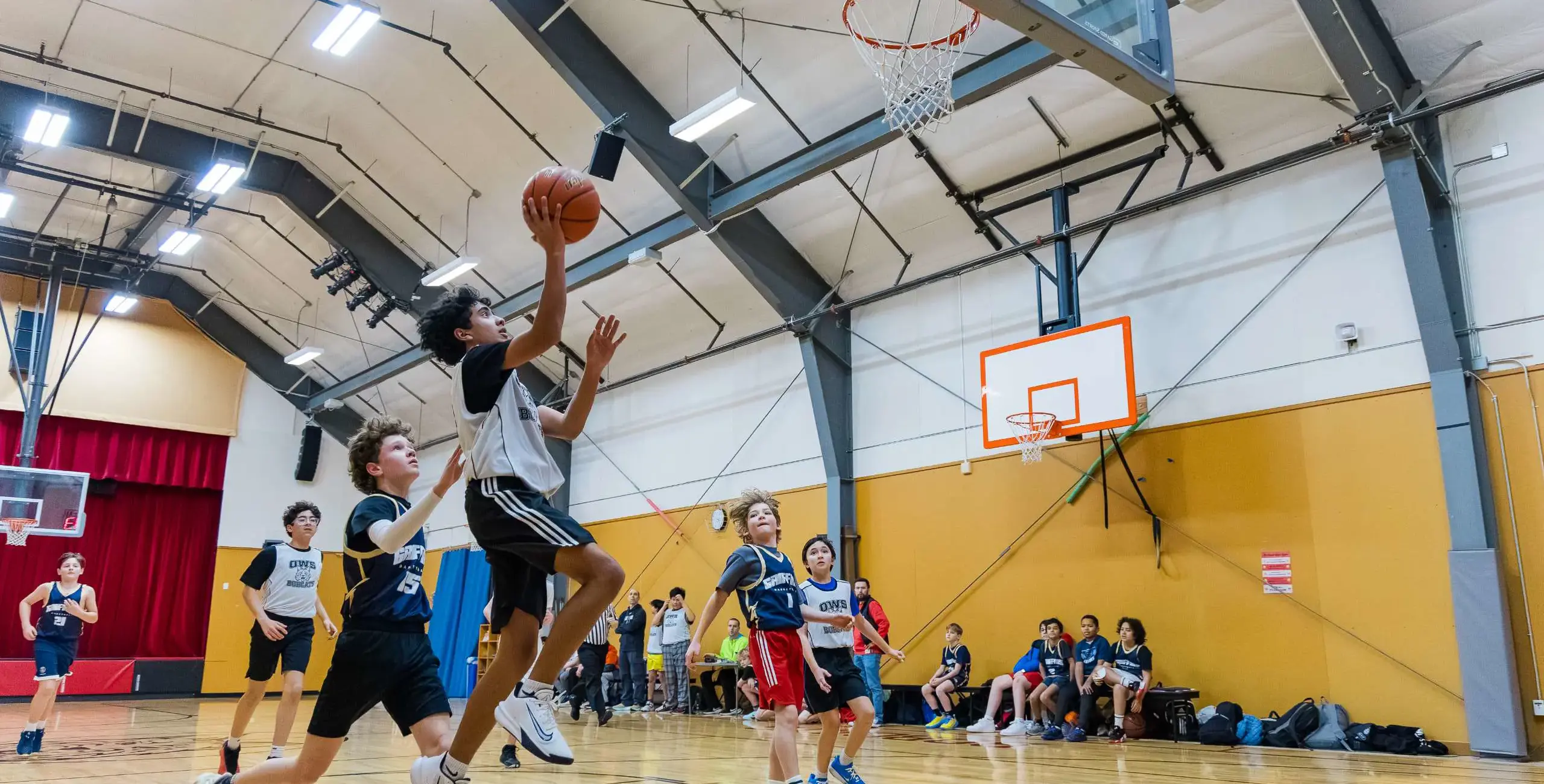 Students playing basketball