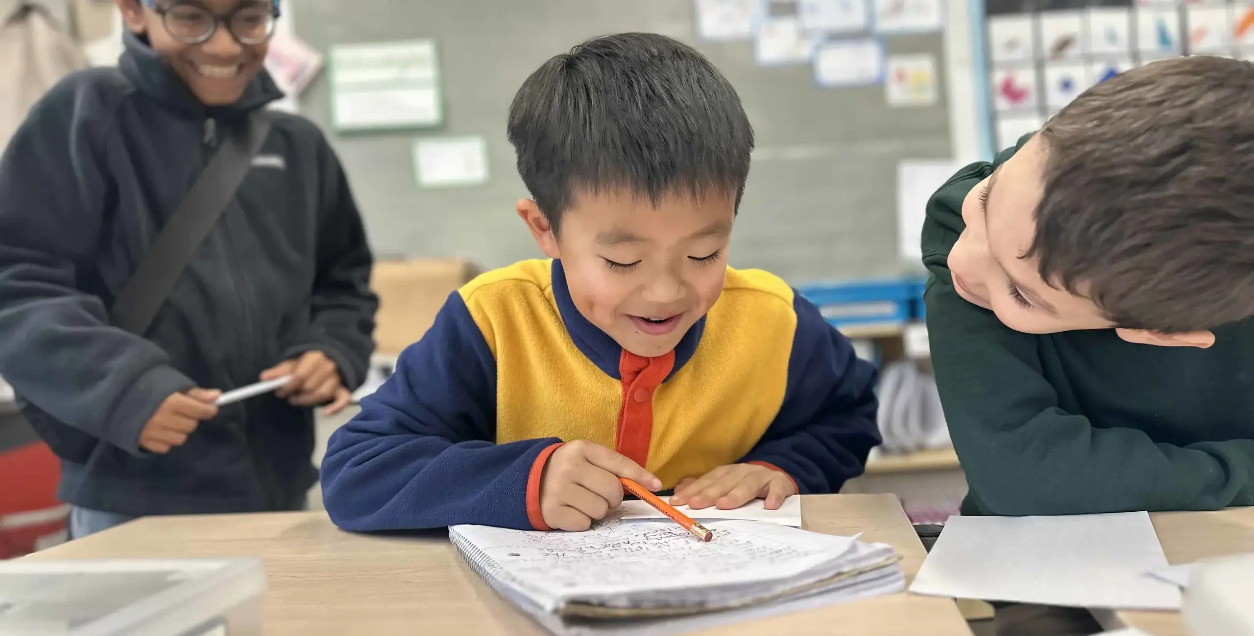 Students going over work together