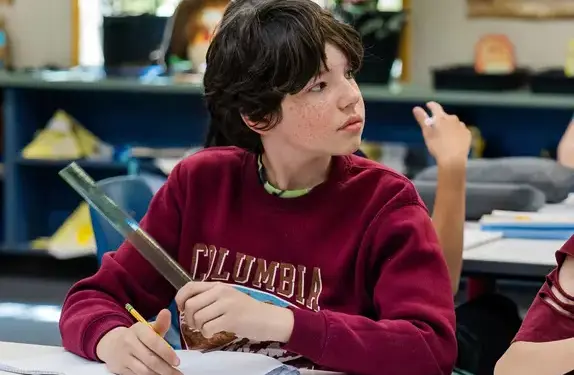 Student working in class