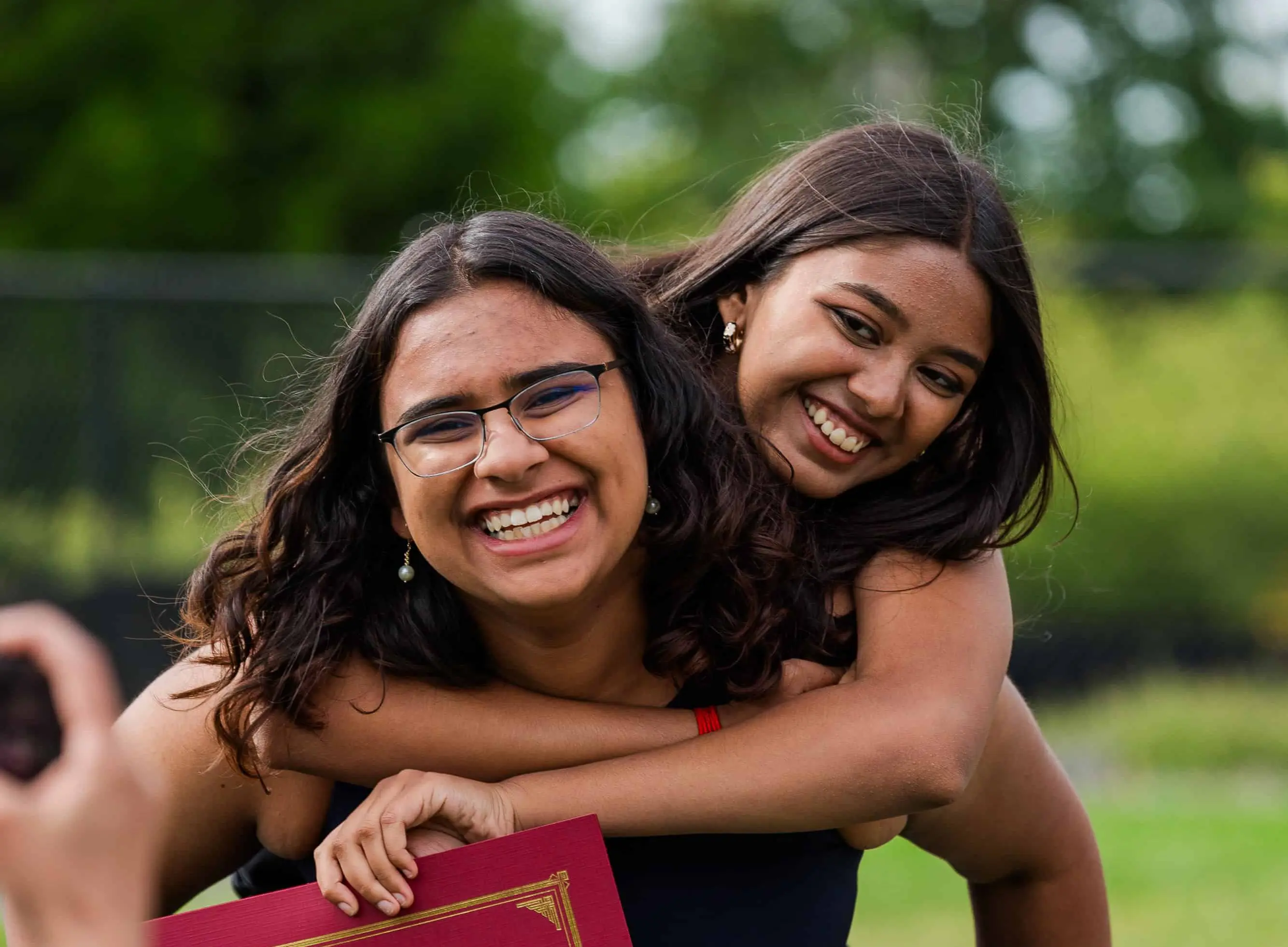 Two students celebrating