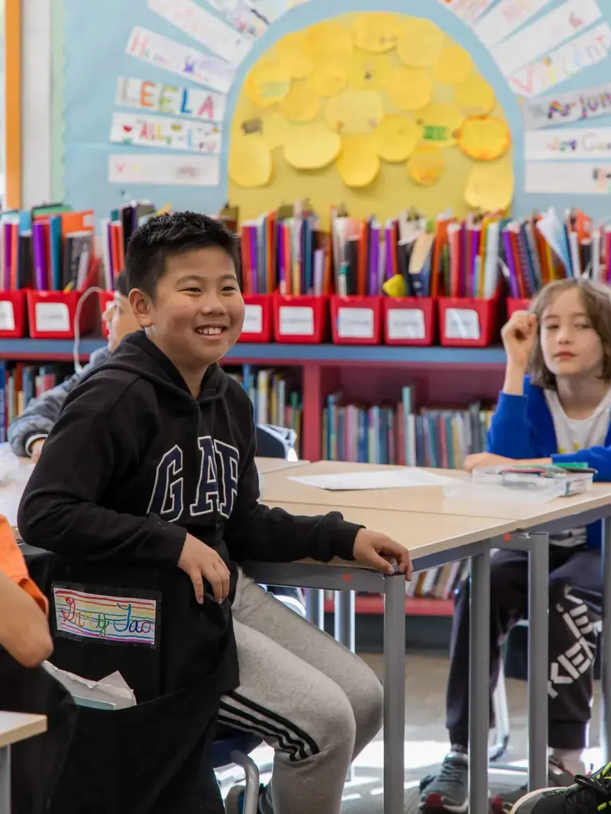 Student smiling in class