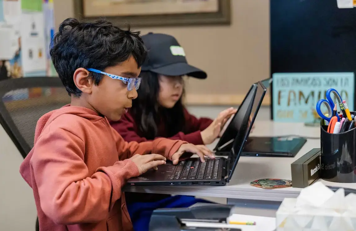 Students working on laptop