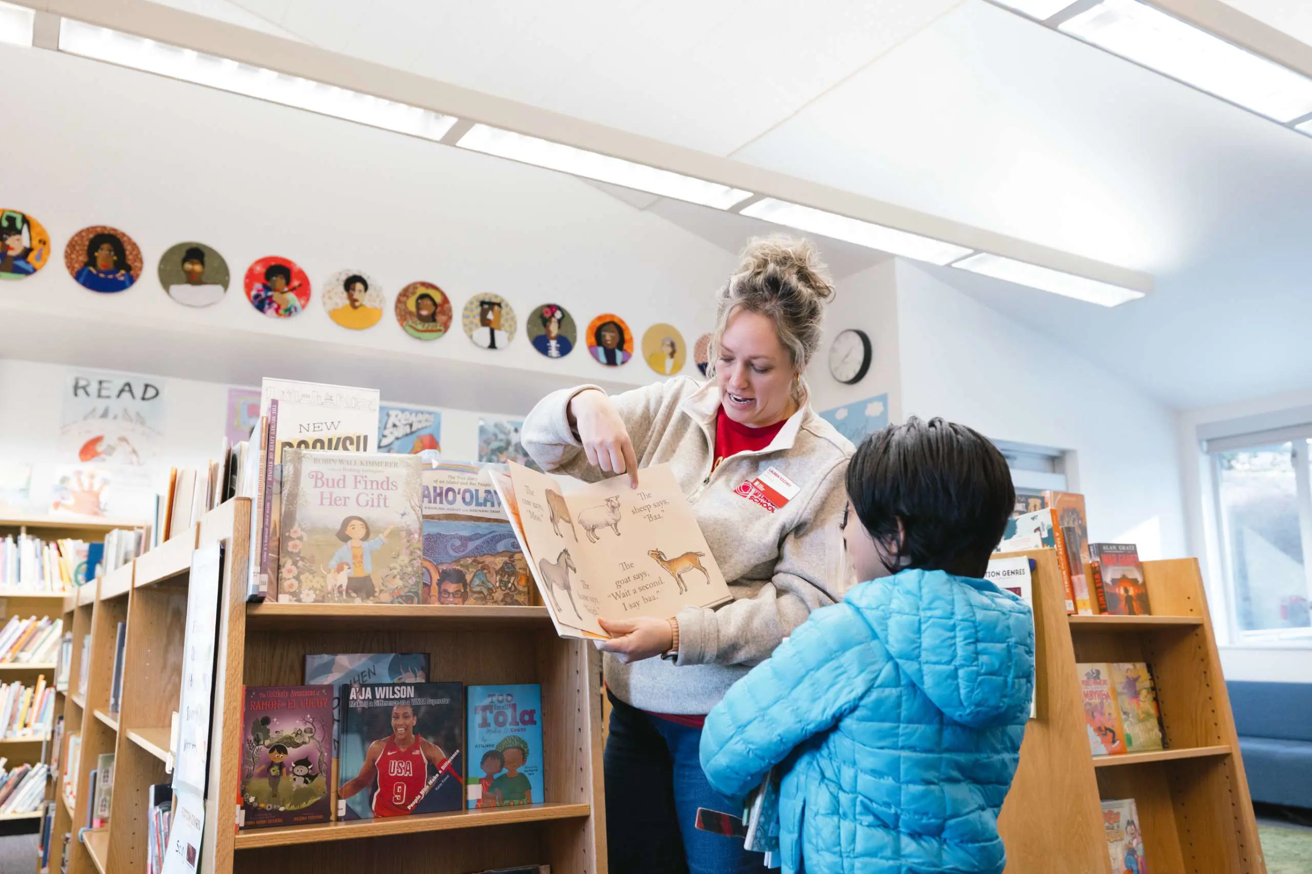 Student and teacher in library