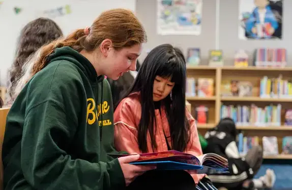 Students reading in library