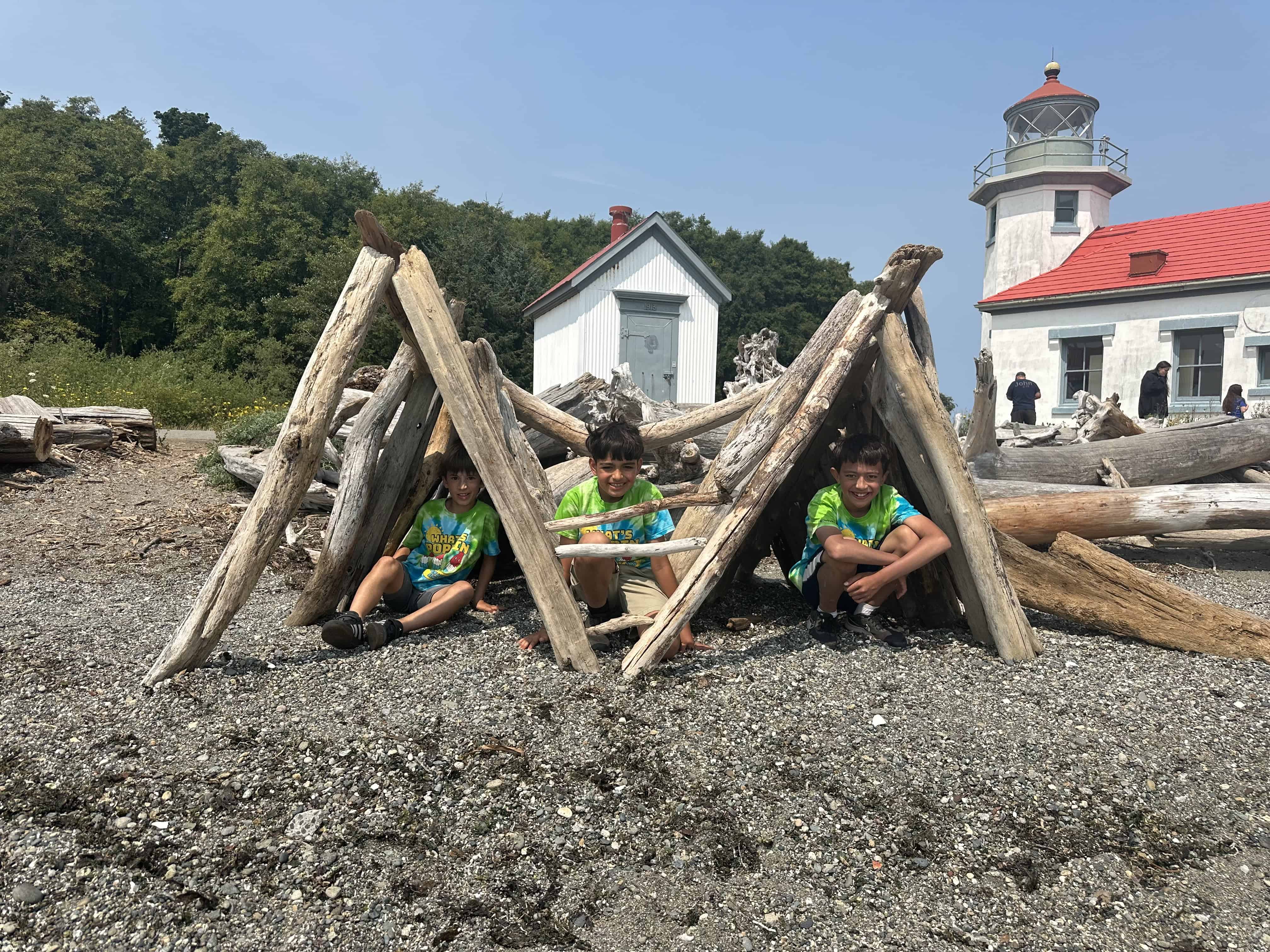 Students sitting at beach