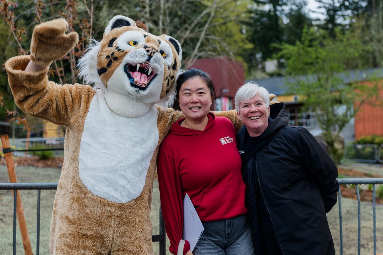 Parents with bobcat mascot