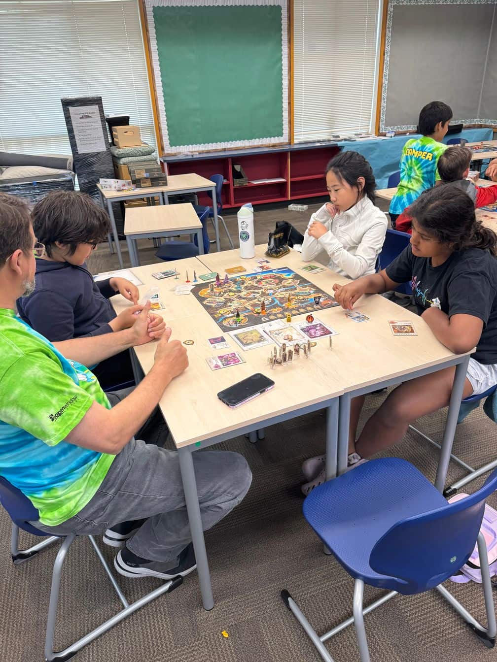 Students playing boardgame